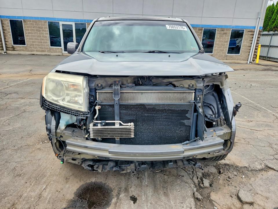 Photo 5 from auction – 2012 HONDA PILOT with VIN 5FNYF4H55CB053081