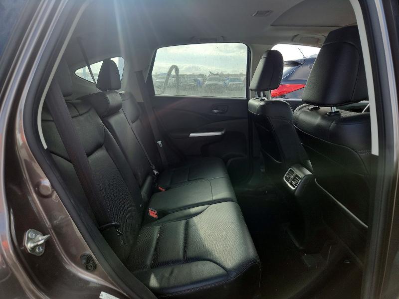 Photo 11 from auction – 2015 HONDA CR-V with VIN 2HKRM3H79FH557466