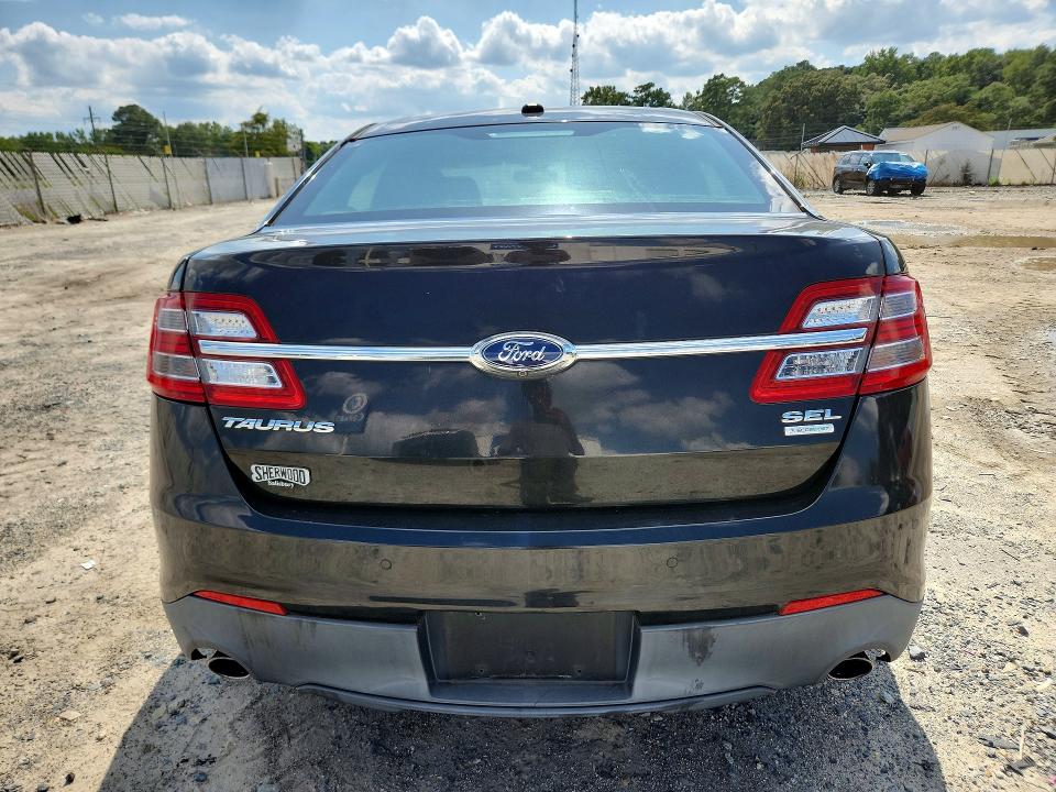 Photo 6 from auction – 2013 FORD TAURUS with VIN 1FAHP2E99DG174010