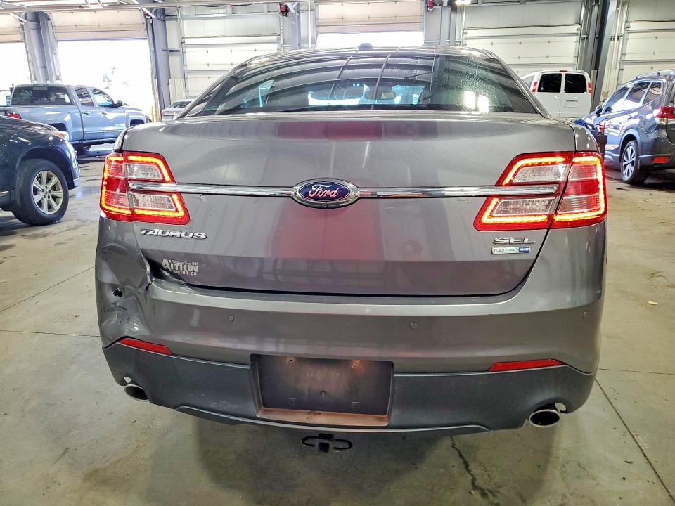 Снимка 6 от търг – 2014 FORD TAURUS с VIN 1FAHP2H81EG112279