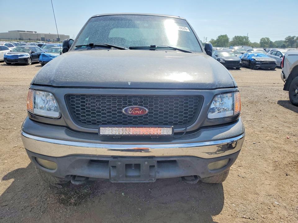 Photo 5 from auction – 2002 FORD F150 with VIN 1FTRW08L72KB31356