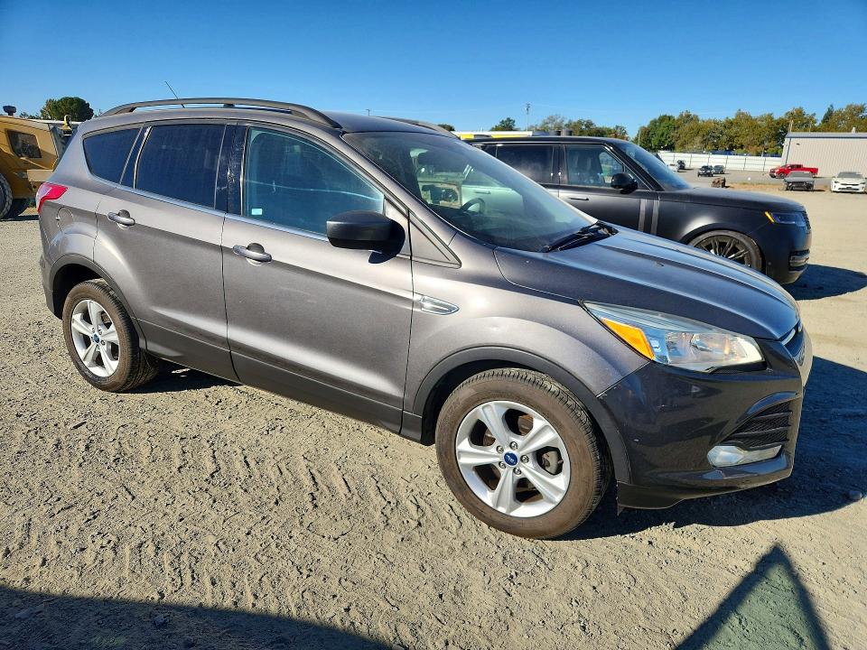Снимка 4 от търг – 2014 FORD ESCAPE с VIN 1FMCU0GX0EUB09560