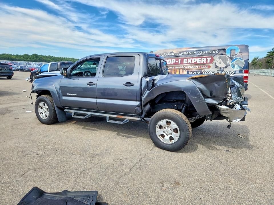 Photo 2 from auction – 2014 TOYOTA TACOMA with VIN 3TMLU4EN1EM160924