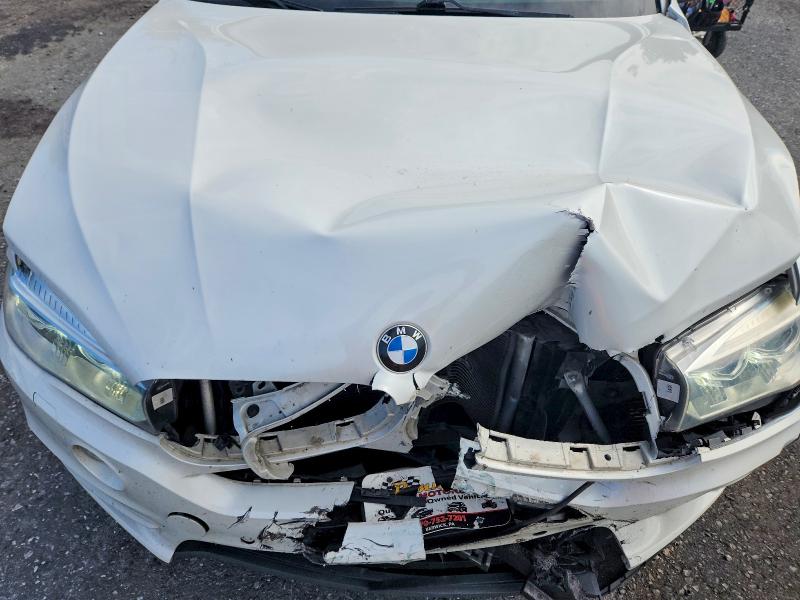 Photo 12 from auction – 2016 BMW X5 with VIN 5UXKR0C55G0U48393