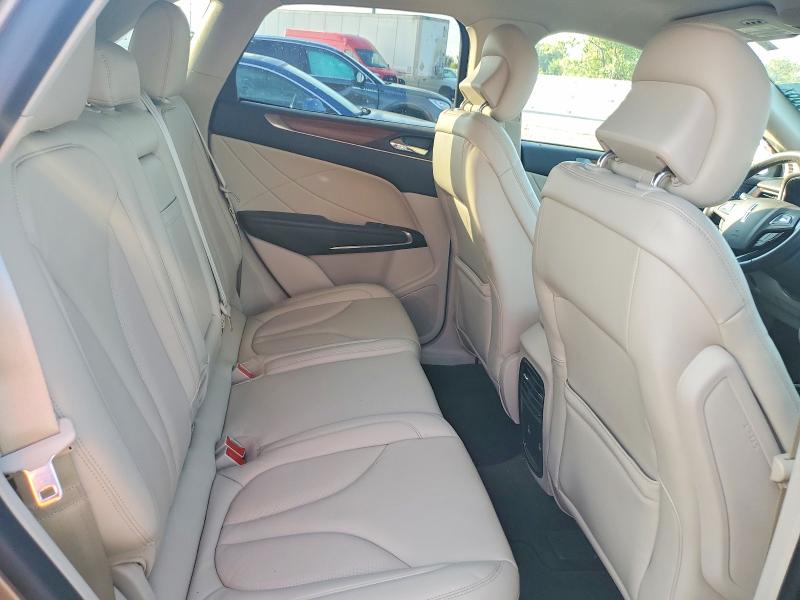 Снимка 11 от търг – 2019 LINCOLN MKC с VIN 5LMCJ2C97KUL09890