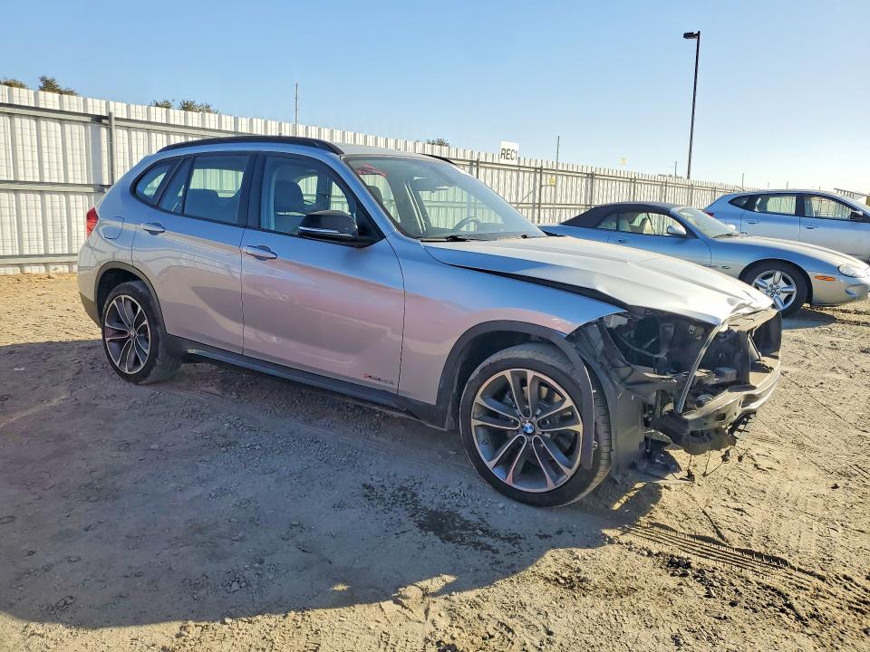 Снимка 4 от търг – 2015 BMW X1 с VIN WBAVL1C51FVY40713