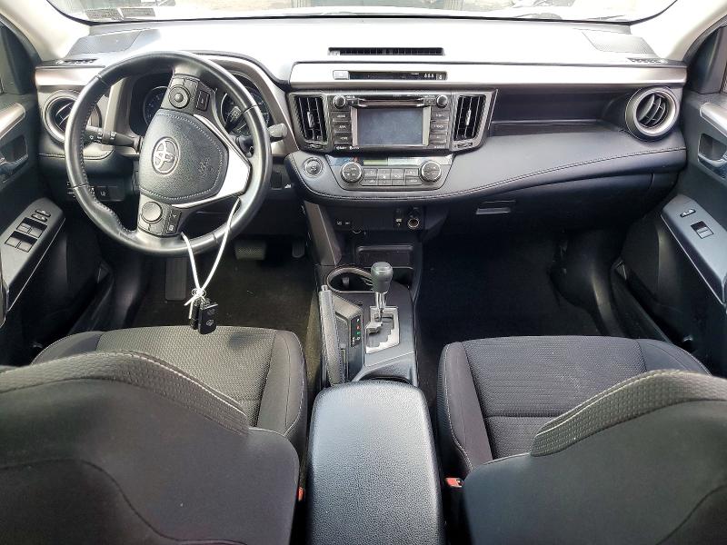 Photo 8 from auction – 2018 TOYOTA RAV4 with VIN JTMRFREV6JJ221211