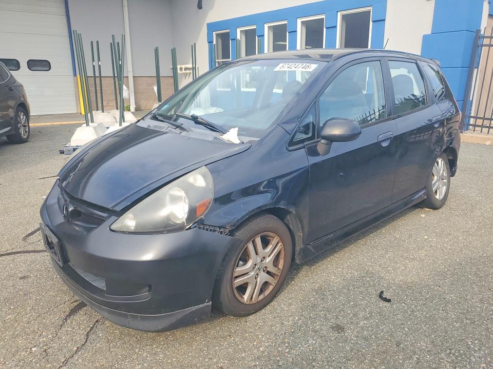 HONDA FIT 2007 with VIN JHMGD38627S048111 - Photo from auction