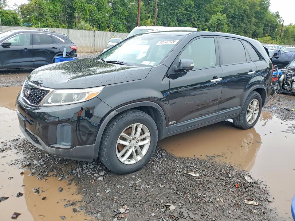KIA SORENTO 2015 with VIN 5XYKTCA63FG614712 - Photo from auction