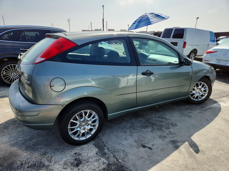 Снимка 3 от търг – 2005 FORD FOCUS с VIN 3FAFP31N65R116723