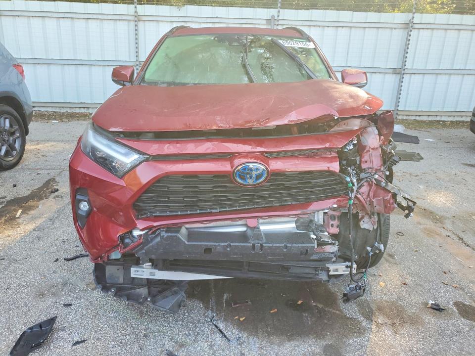 Photo 5 from auction – 2023 TOYOTA RAV4 with VIN JTMB6RFV5PD115758