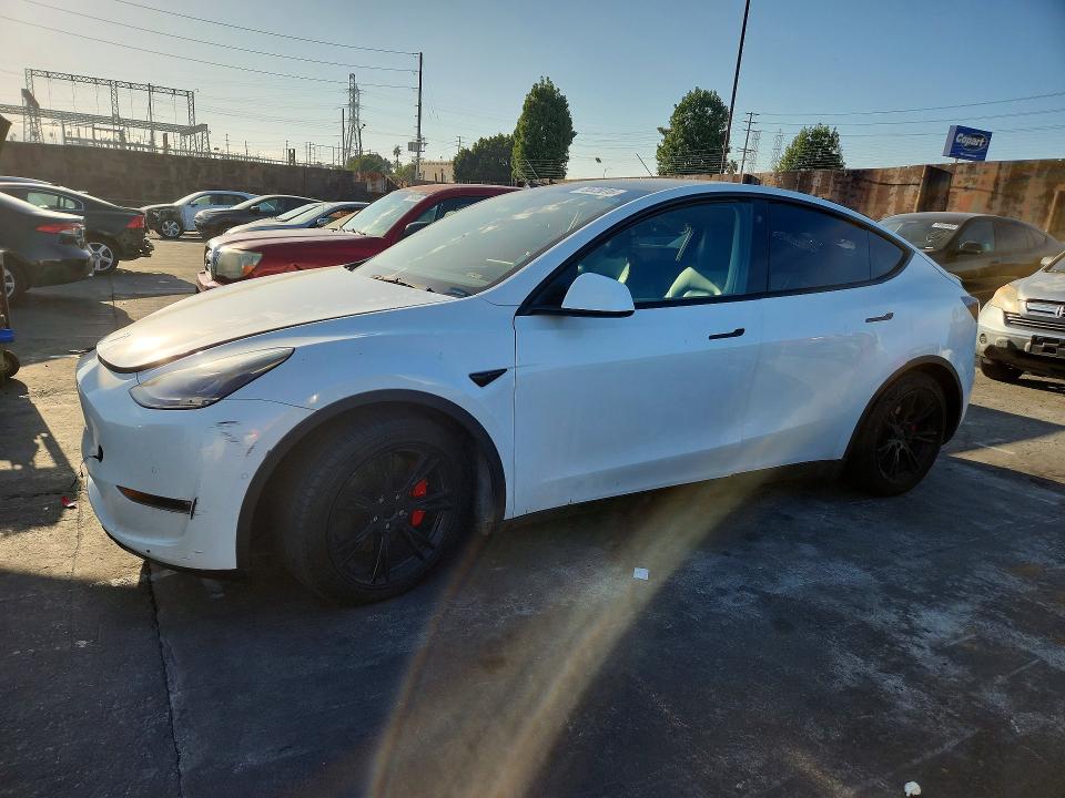 TESLA MODEL Y 2021 с VIN 5YJYGDEF0MF124487 - Снимка от търг
