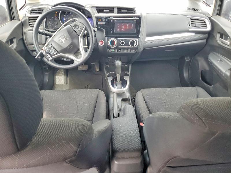 Снимка 8 от търг – 2016 HONDA FIT с VIN JHMGK5H76GX036816