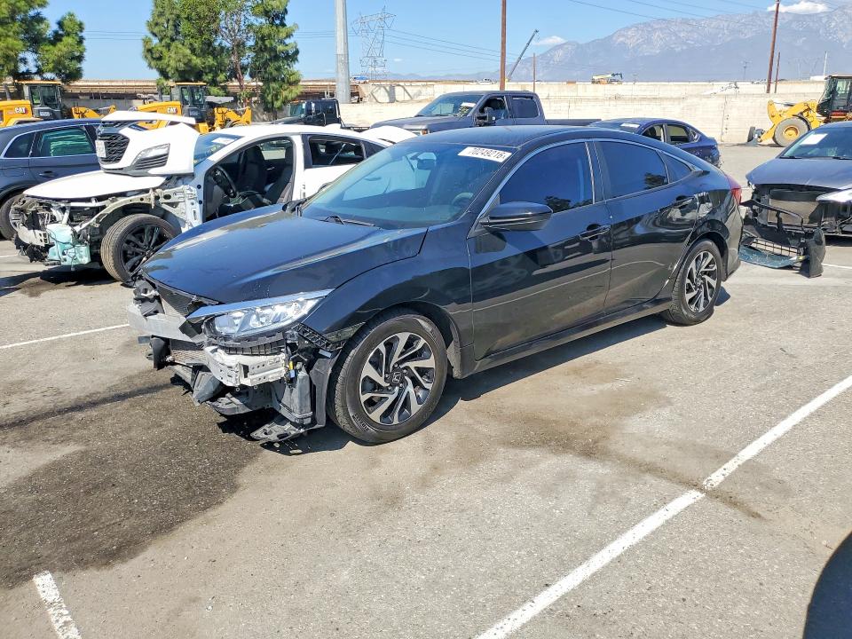 HONDA CIVIC 2016 with VIN 2HGFC2F57GH565093 - Photo from auction
