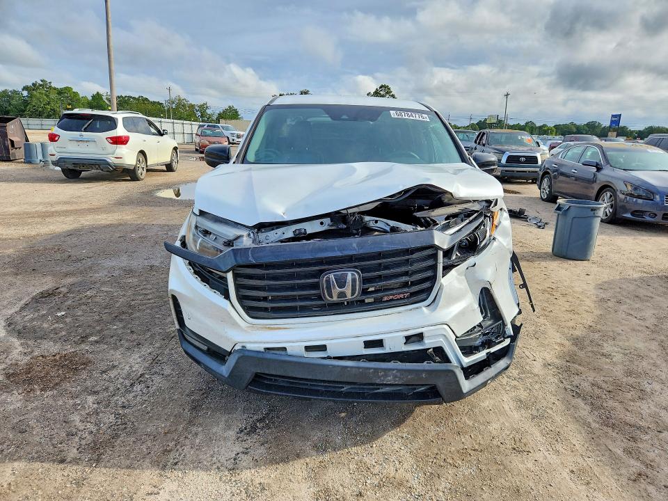Photo 5 from auction – 2021 HONDA RIDGELINE with VIN 5FPYK3F14MB014450