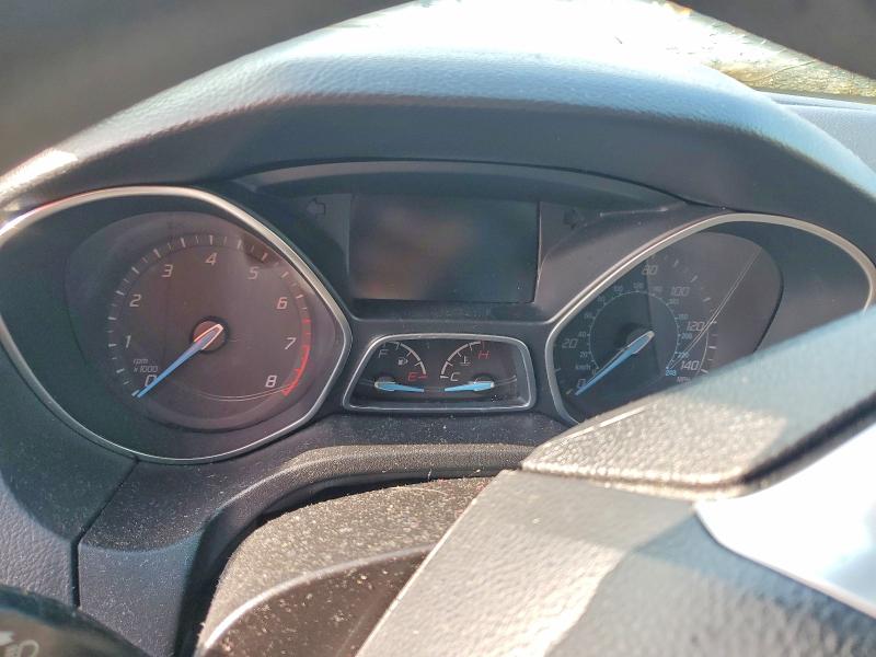 Photo 9 from auction – 2014 FORD FOCUS with VIN 1FADP3F25EL243712