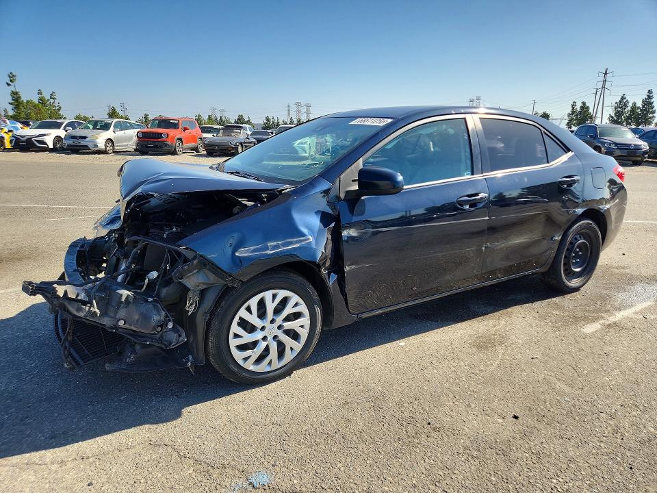 Снимка 1 от търг – 2018 TOYOTA COROLLA с VIN 5YFBURHE0JP769297