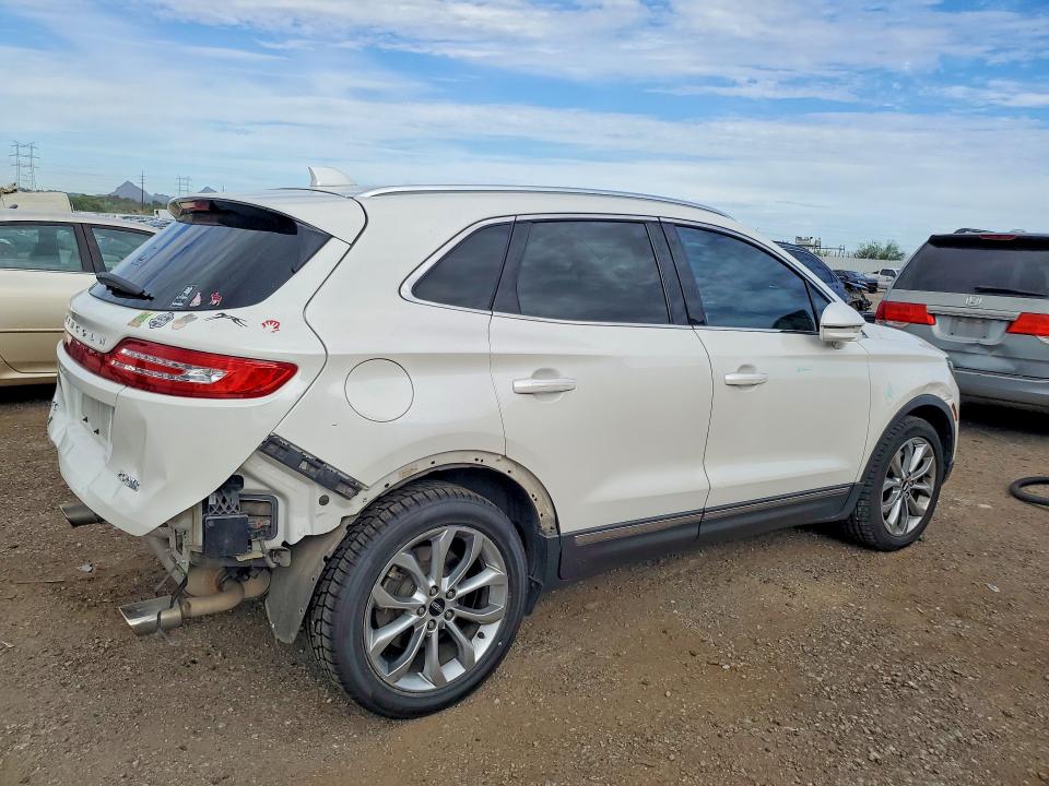 Photo 3 from auction – 2015 LINCOLN MKC with VIN 5LMCJ2A95FUJ13536