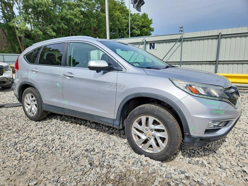 Photo 4 from auction – 2016 HONDA CR-V with VIN 5J6RM4H71GL042510