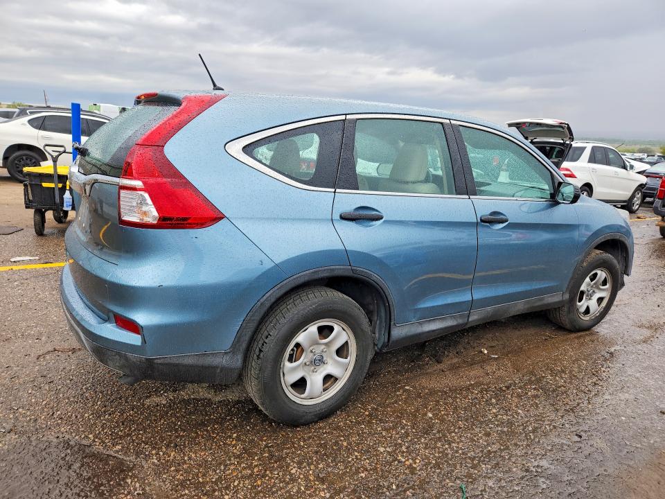 Photo 3 from auction – 2015 HONDA CR-V with VIN 2HKRM3H36FH556286