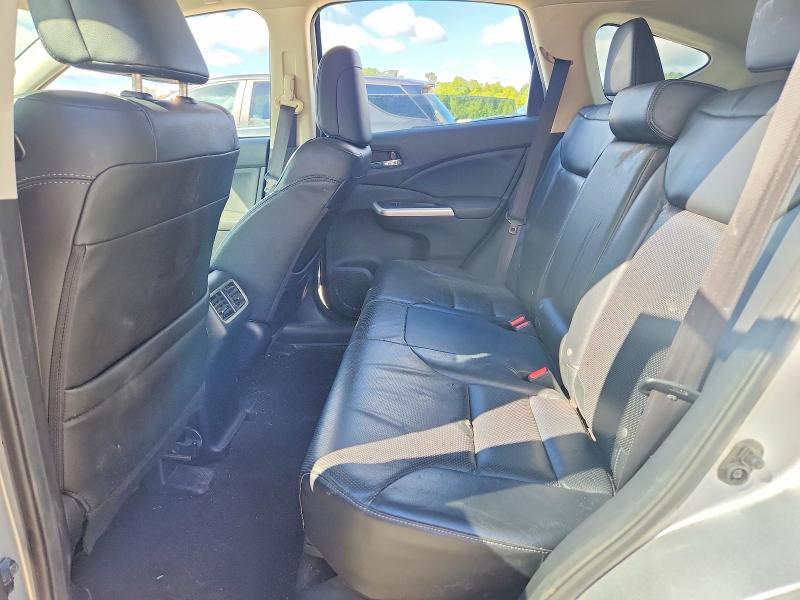 Photo 11 from auction – 2016 HONDA CR-V with VIN 2HKRM4H71GH713670