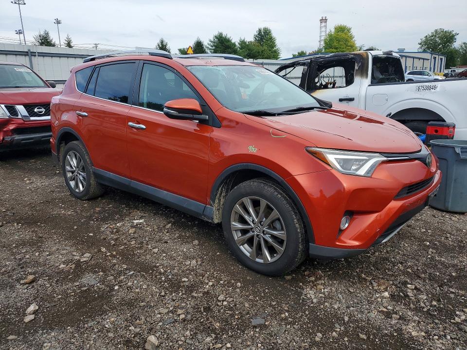 Photo 4 from auction – 2016 TOYOTA RAV4 with VIN 2T3DFREV7GW476423