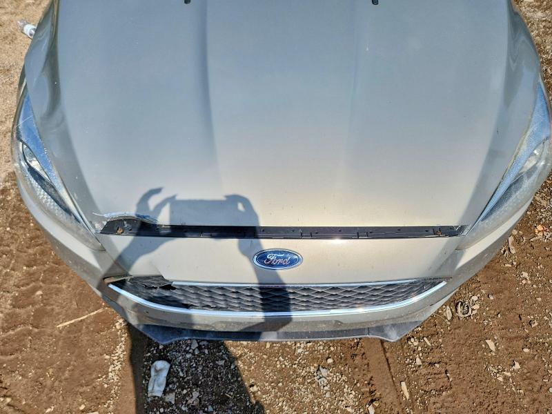 Photo 11 from auction – 2016 FORD FOCUS with VIN 1FADP3F28GL309821