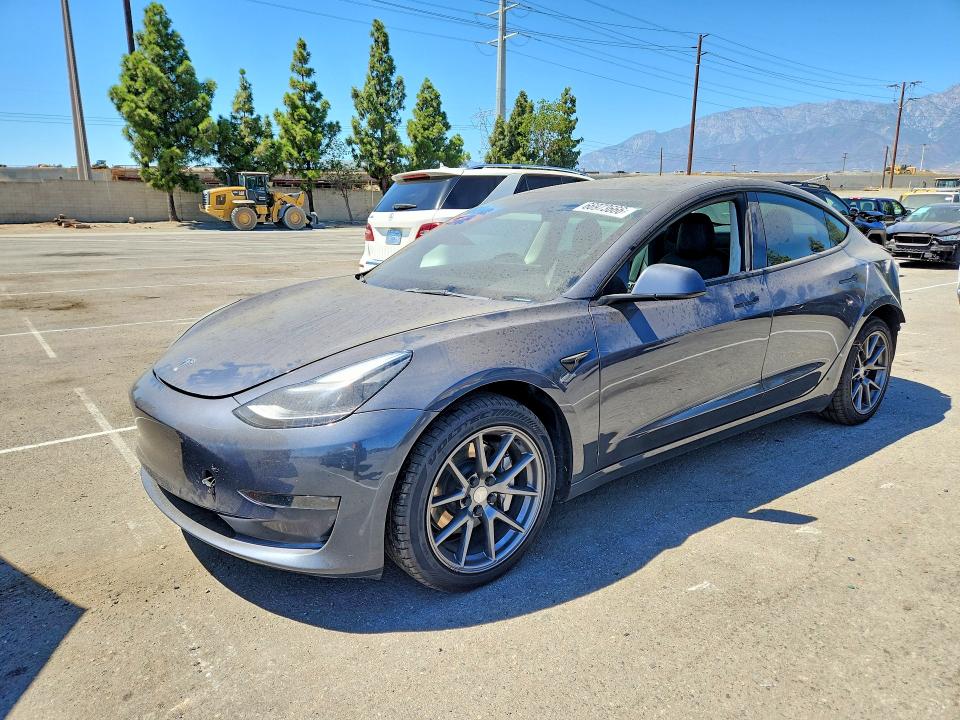 TESLA MODEL 3 2023 with VIN 5YJ3E1EA4PF385998 - Photo from auction
