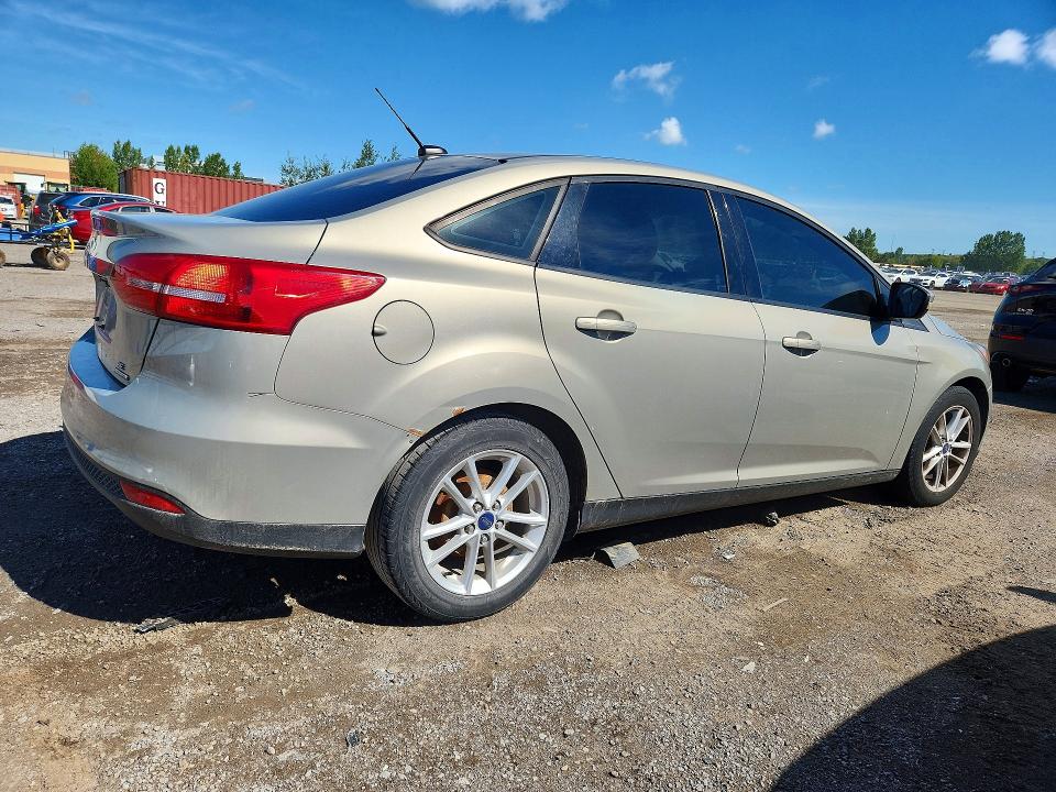 Photo 3 from auction – 2015 FORD FOCUS with VIN 1FADP3F2XFL320253