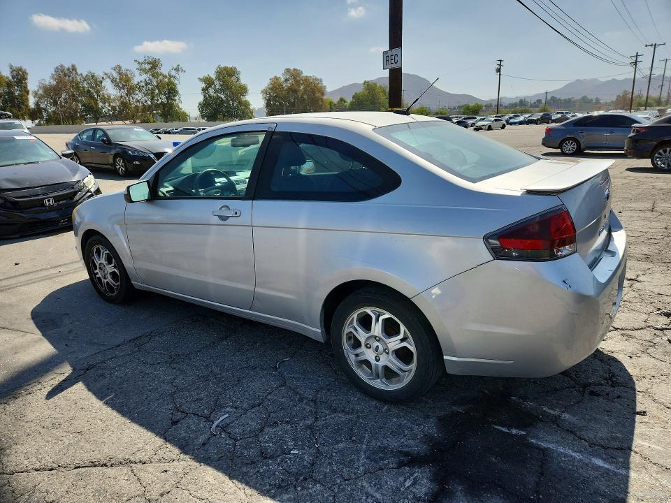 Снимка 2 от търг – 2009 FORD FOCUS с VIN 1FAHP32N99W165716
