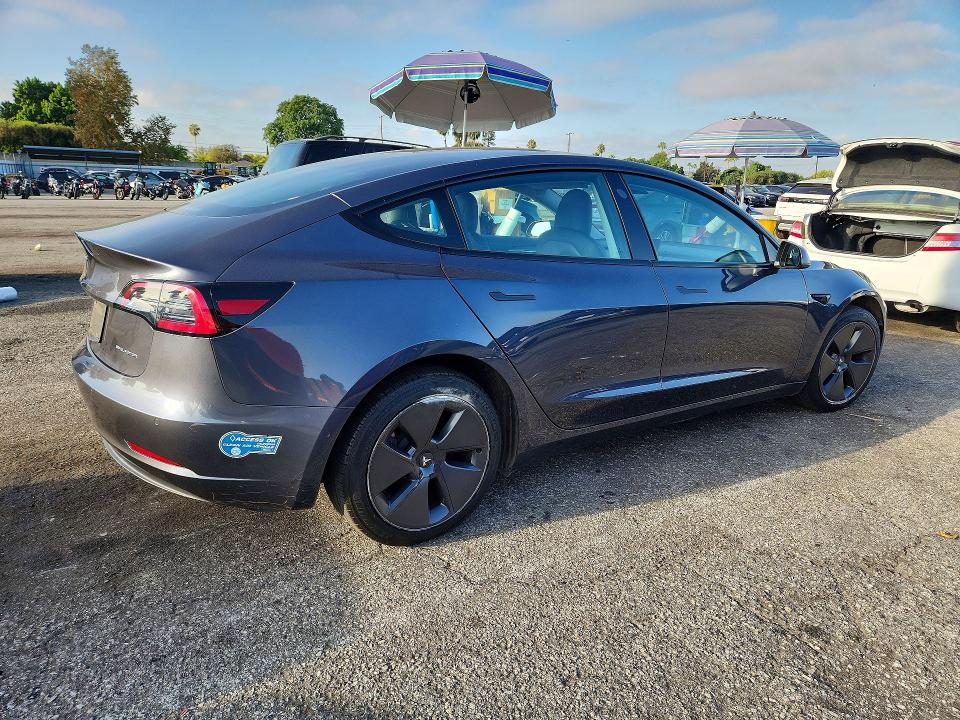 Photo 3 from auction – 2021 TESLA MODEL 3 with VIN 5YJ3E1EB1MF997791
