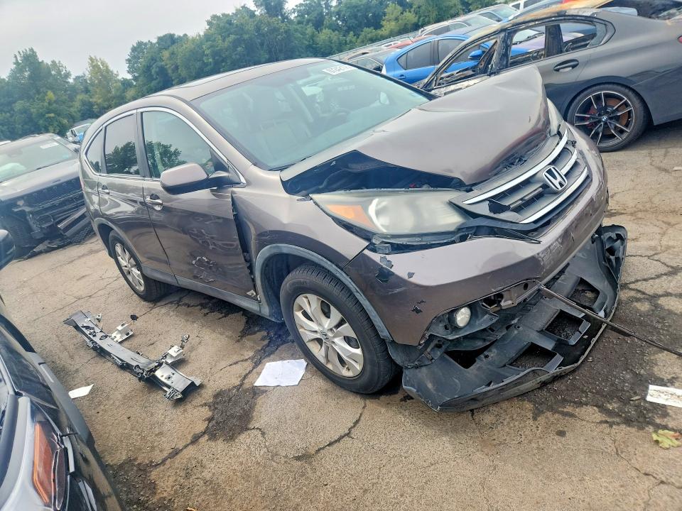 Photo 4 from auction – 2013 HONDA CR-V with VIN 5J6RM4H53DL004027