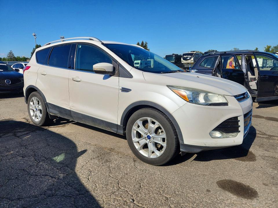 Photo 4 from auction – 2014 FORD ESCAPE with VIN 1FMCU0JX5EUC52531