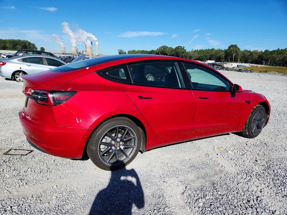 Снимка 3 от търг – 2022 TESLA MODEL 3 с VIN 5YJ3E1EA7NF101213