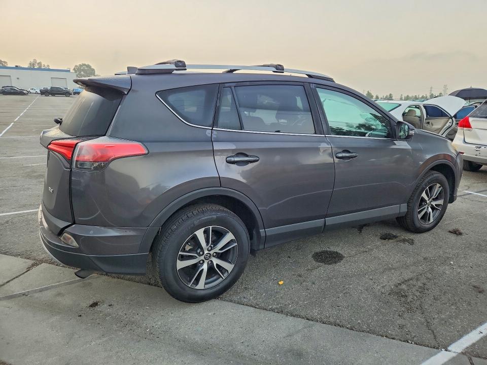 Zdjęcie 3 z aukcji – 2016 TOYOTA RAV4 z VIN 2T3WFREV2GW240674