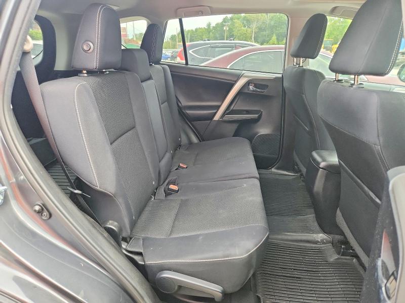 Photo 11 from auction – 2018 TOYOTA RAV4 with VIN 2T3RFREVXJW780231