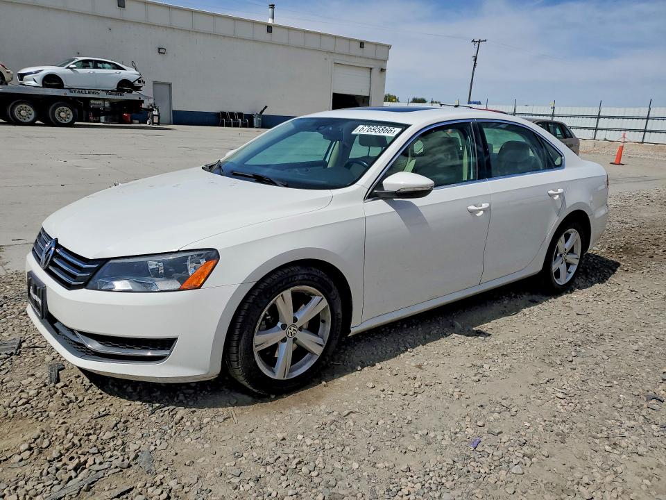 VOLKSWAGEN PASSAT 2012 с VIN 1VWBP7A31CC043672 - Снимка от търг