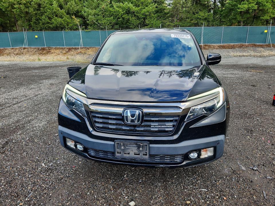 Photo 5 from auction – 2017 HONDA RIDGELINE with VIN 5FPYK3F89HB033837