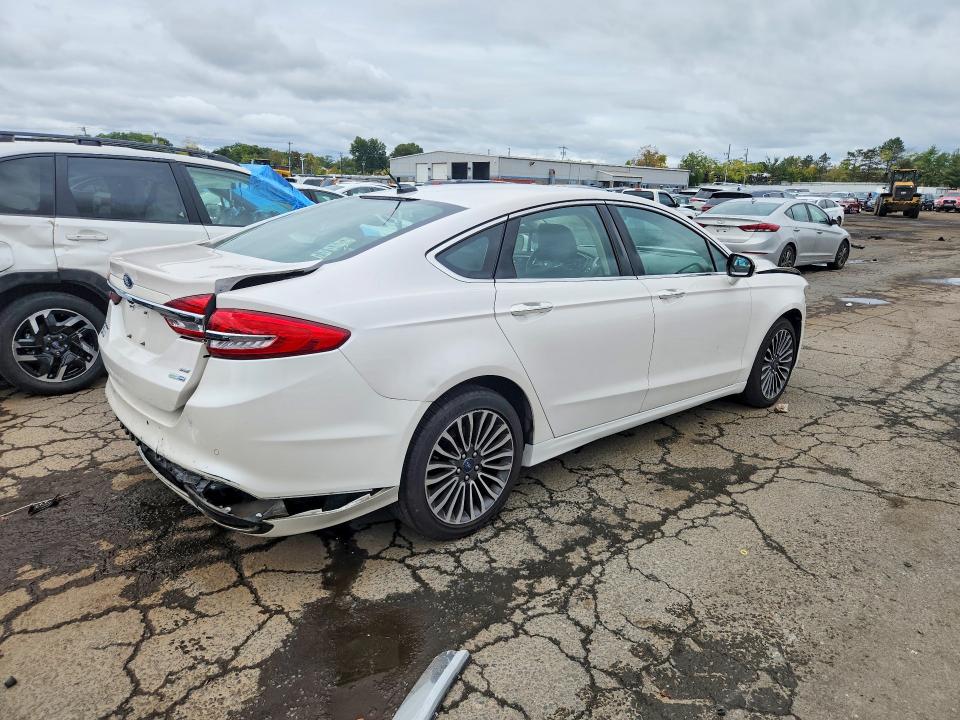 Photo 3 from auction – 2017 FORD FUSION with VIN 3FA6P0T9XHR243526
