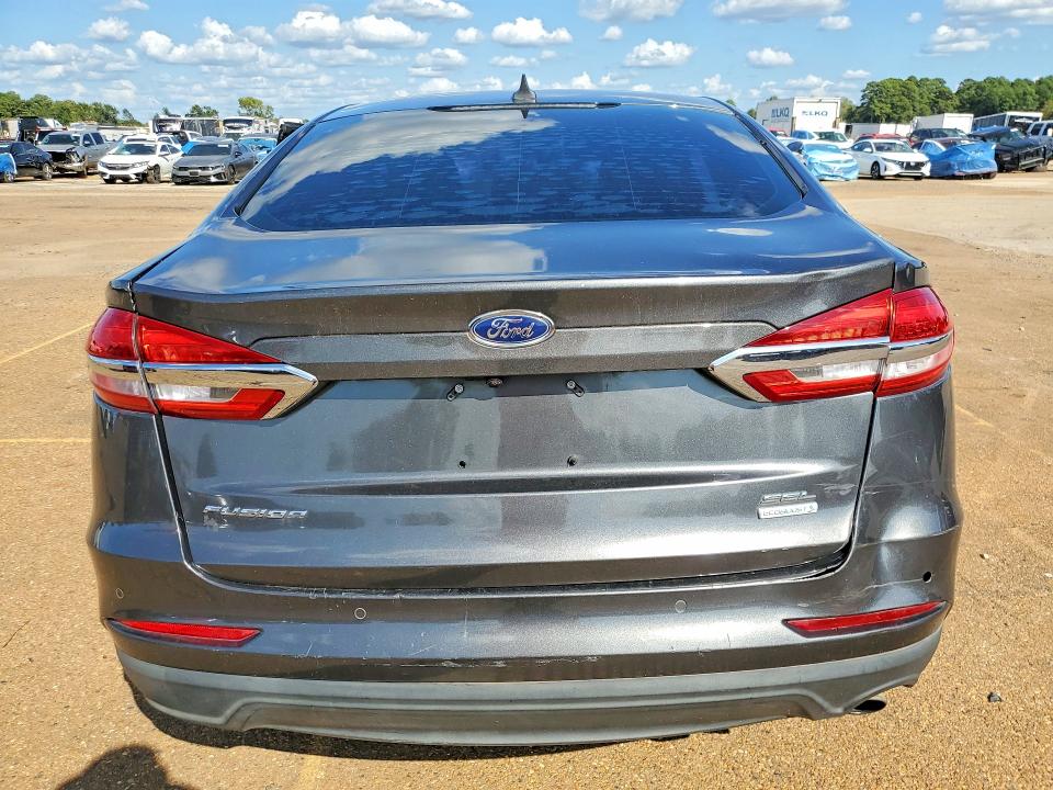 Снимка 6 от търг – 2019 FORD FUSION с VIN 3FA6P0CD3KR150911