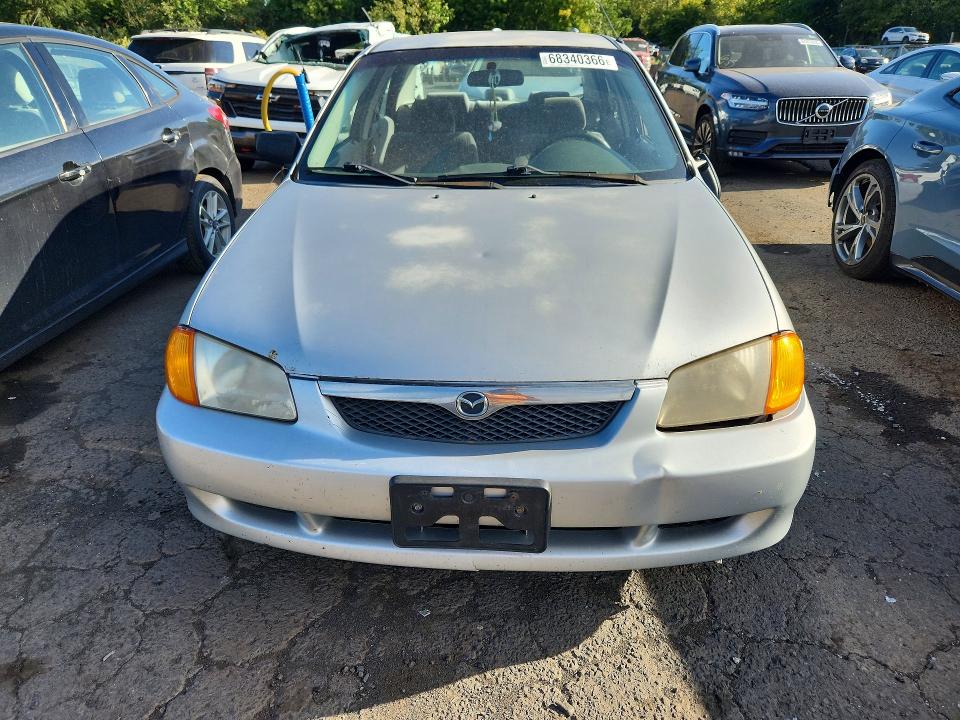 Photo 5 from auction – 2000 MAZDA PROTEGE with VIN JM1BJ222XY0271496