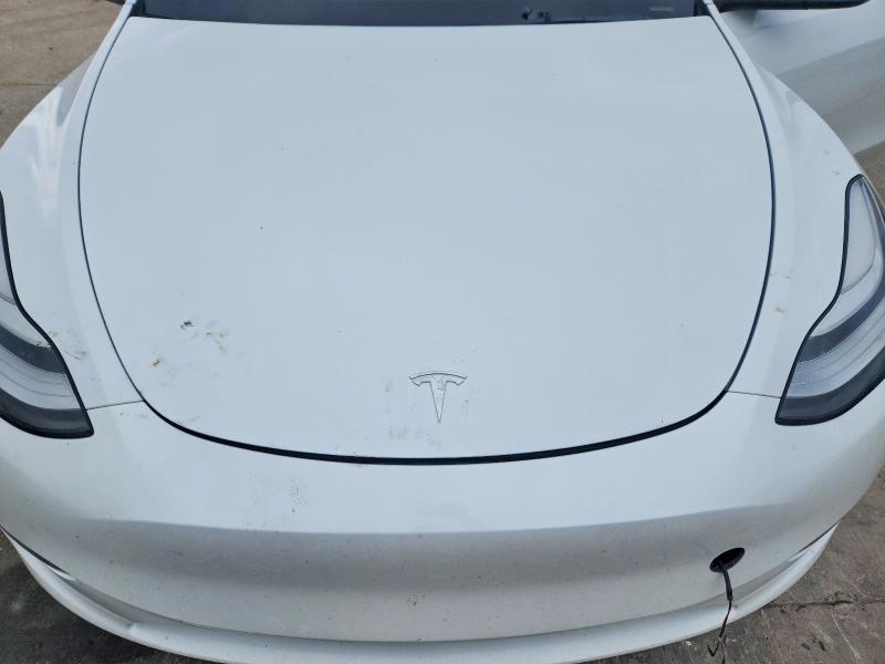 Photo 11 from auction – 2023 TESLA MODEL Y with VIN 7SAYGDEEXPF615728
