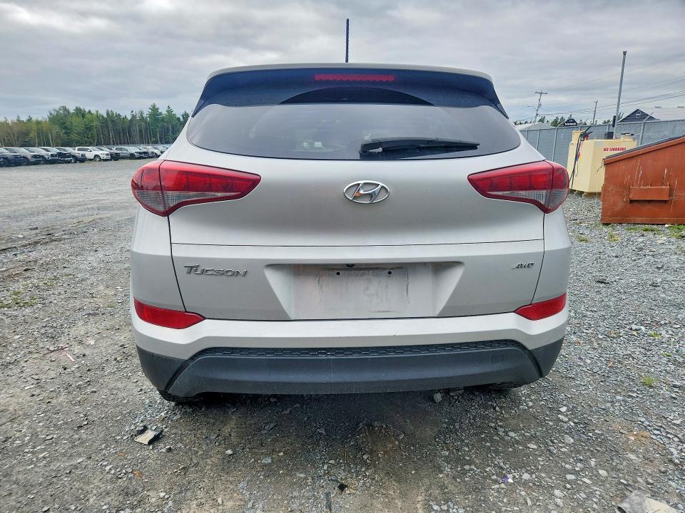 Снимка 6 от търг – 2016 HYUNDAI TUCSON с VIN KM8J3CA4XGU052104