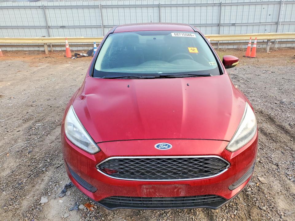 Foto 5 de la subasta – 2016 FORD FOCUS con VIN 1FADP3F26GL351663