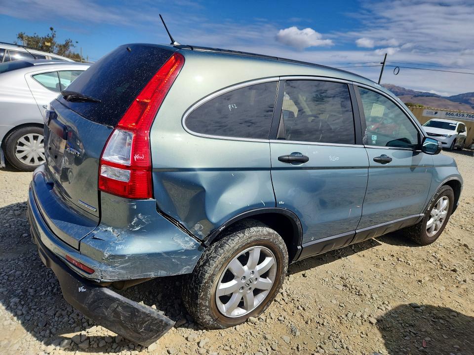 Photo 3 from auction – 2011 HONDA CR-V with VIN 5J6RE4H46BL087292