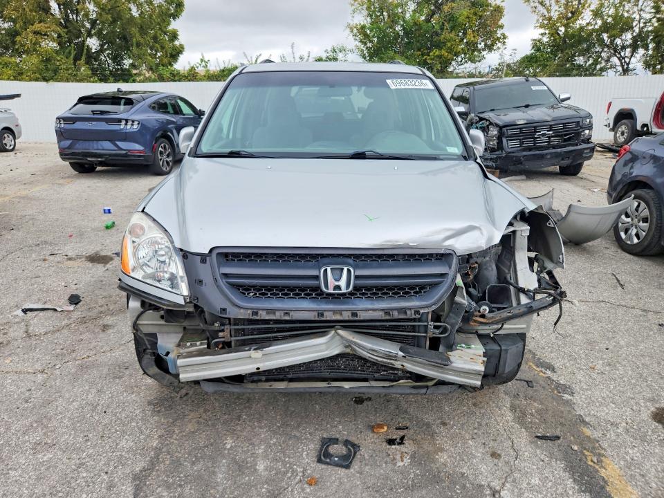Photo 5 from auction – 2004 HONDA PILOT with VIN 2HKYF18434H587186