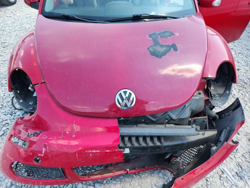 Photo 11 from auction – 2010 VOLKSWAGEN NEW BEETLE with VIN 3VWPG3AG1AM017179