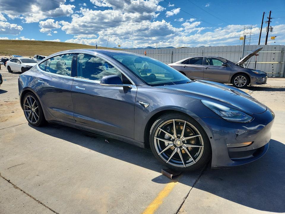 Photo 4 from auction – 2018 TESLA MODEL 3 with VIN 5YJ3E1EA5JF023718
