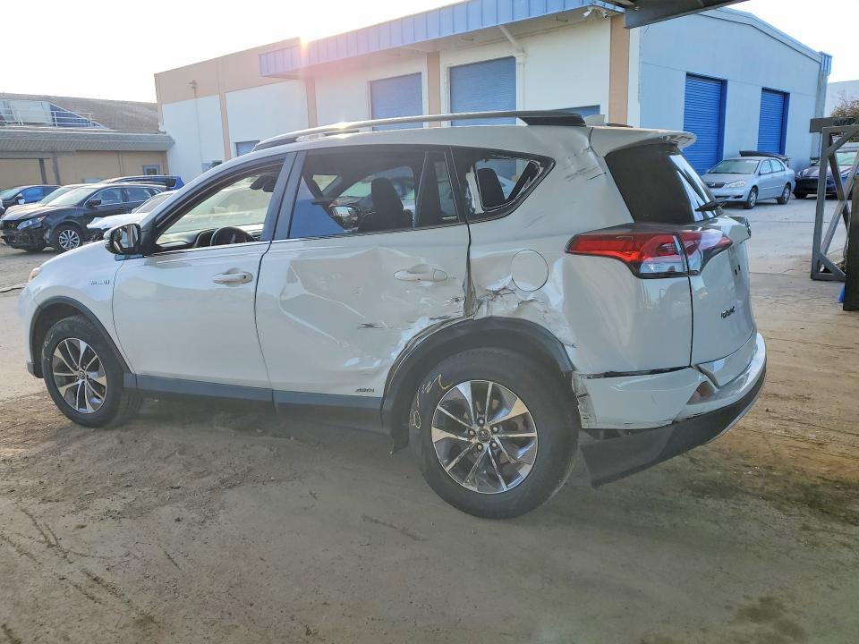 Photo 2 from auction – 2017 TOYOTA RAV4 HYBRID with VIN JTMRJREV6HD138367