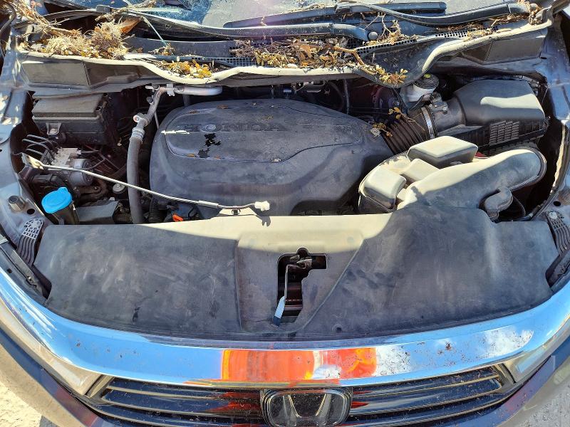 Photo 12 from auction – 2023 HONDA ODYSSEY with VIN 5FNRL6H84PB017908